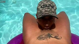 lucky stranger massages this cute skinny latina slut at the hotel pool 😏 her natural tits and pussy get fingered