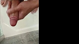 blue-eyed bodybuilder blonde showers his huge cock