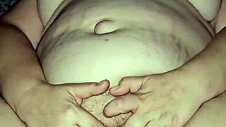 Milf fingers her soft pussy until she cums hard