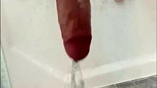 blue-eyed bodybuilder blonde showers his huge cock