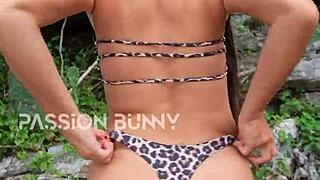 Hey, watch this cute bikini girl dance and finger outdoors!