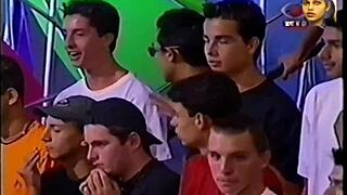 Daniela Reis performs energetic striptease undressing fully in 2001 Brazil video