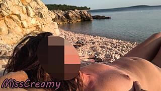 Pussy-flashing nude teacher lets student grope tits on beach