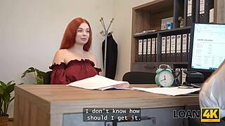 A big-titted redhead gets tempted by a cock during her office interview.
