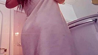hot blonde strips naked bathroom tits ass tease