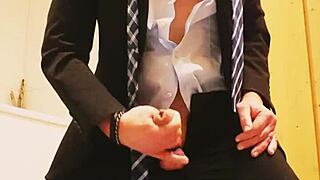 Man masturbates while dressed in business suit