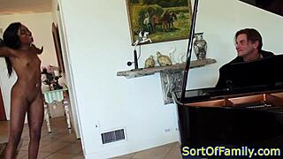 Ebony amateur teen bent over doggystyled near piano in reality clip