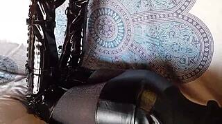 Petite brunette milf rocks total black latex fishnets pantyhose knee boots