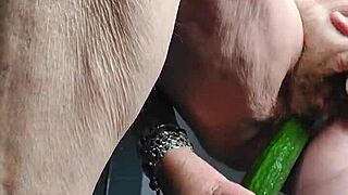 German granny stuffs hairy pussy with cucumber toy