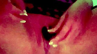 Blonde flashes tight pussy lips up close with vibrator