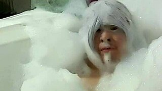 cyno slips into bubbly cosplay bath for solo tease