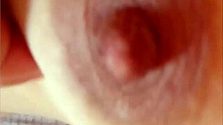 Gretala pinches her natural tit nipple teasingly