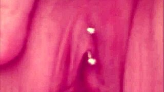 Intimate Close-Up of Pierced Shaved Pussy Peeing Fetish