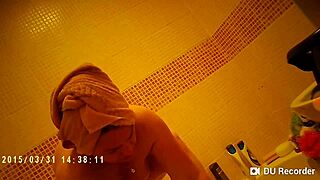 spy cam catches shower babe with nude tits