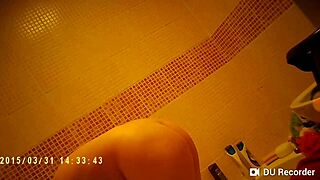 spy cam catches shower babe with nude tits