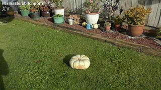 trashy milf squats on giant pumpkin pissing dirty in the garden