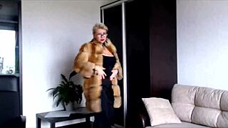 mature webcam whore aimee strips fur coat seductively