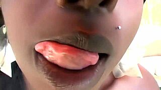 Ebony teen beauty slurps throbbing cock hungrily