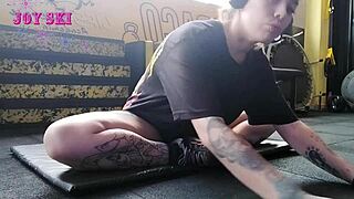 ALTERNATIVE TATTOO GIRL STRETCHES SEXY YOUNG BODY IN GYM!