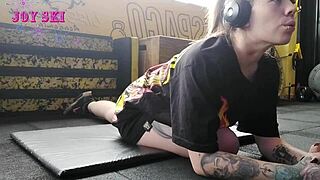 ALTERNATIVE TATTOO GIRL STRETCHES SEXY YOUNG BODY IN GYM!