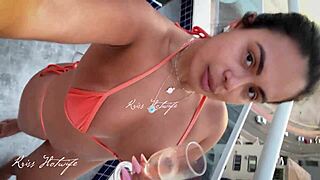 exhibitionist wife poses by penthouse pool