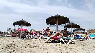 huge titted brunette teases amateurs beach flaunt part 2!