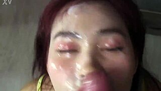 cum-covered cutie rubs it all over face