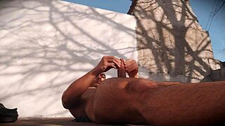 muscular hunk strokes monster cock outdoors hard