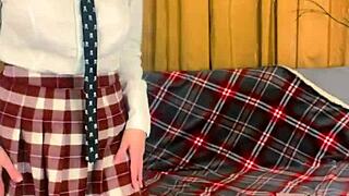 a busty teacher curiously explores her strapon toy in private after class, building anticipation step by step