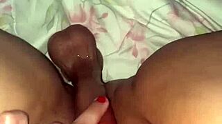 frotando my big clit with dildo through dark bodysuit