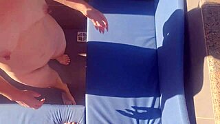 poolside redhead seduction leads to oiled bareback pool passion