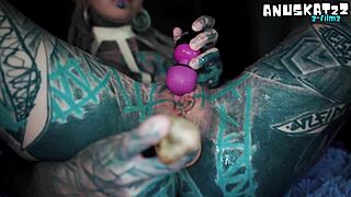 I feel the anal orgasm rush through my latex-clad tattooed body as metal toy gapes me wide