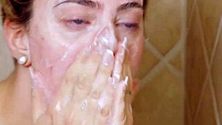 gorgeous blonde steps into steamy shower bliss