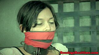 bdsm slave bound to poles endures rough dildo domination