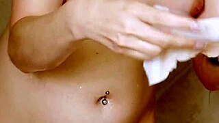 gorgeous blonde steps into steamy shower bliss