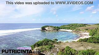 asian babe putri cinta fingers bum hole on beach