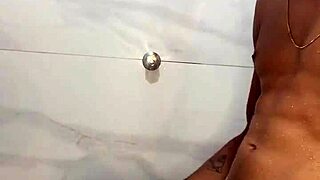 BIG ASS BRUNETTE BATHROOM FUCK ENDS IN FACIAL CREAMPIE!