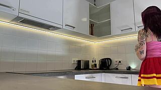 Hottest Redhead Tattooed Cheerleader Flashes See-Through Panties Kitchen Tease