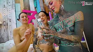 Lubricious Goth Lesbians Oil Up for Threesome Toy Fingering