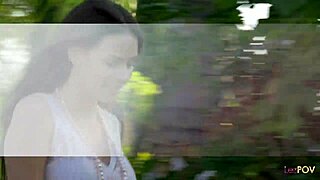 enjoying a romantic outdoor kiss with her