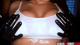 Hot brunette oiled up deepthroats black masseur's monster cock