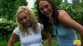 her big nipples harden as the lesbian pinches them hard before cumming wildly outdoors