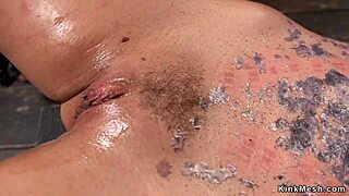 Blonde bound and waxed in kinky device bondage torment