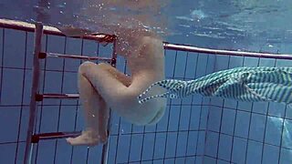 sexy petite russian teen Libuse flaunts small tits at beach pool