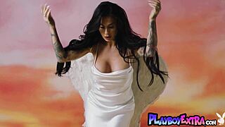 joanna angel strips uniform revealing tattoos and sultry milf body