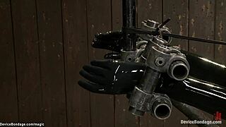 Bound dyke slave chokes in extreme BDSM whipping device torment?
