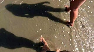 couple sneaks public beach fuck as onlookers spot the hairy pussy wife getting pounded