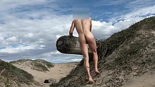 Athletic babe poses nude teases cock intensely at beach cums in plaza