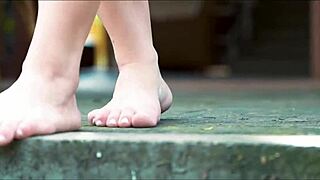 Luiza Marcato looks so sexy rubbing her shaved pussy in the garden alone