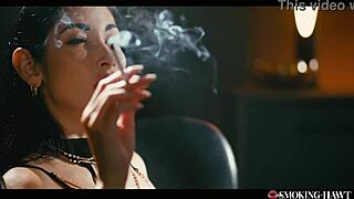 Smoking French slut strokes huge fake tits while dirty talking and masturbating